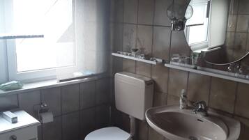 Hair dryer, towels, soap, toilet paper