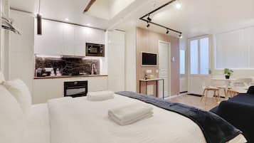 1 bedroom, laptop workspace, iron/ironing board, bed sheets