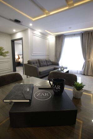 Signature-Suite, 3 Schlafzimmer | Wohnbereich