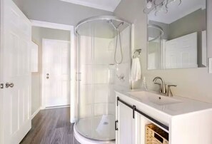 Shower, hair dryer, towels, soap