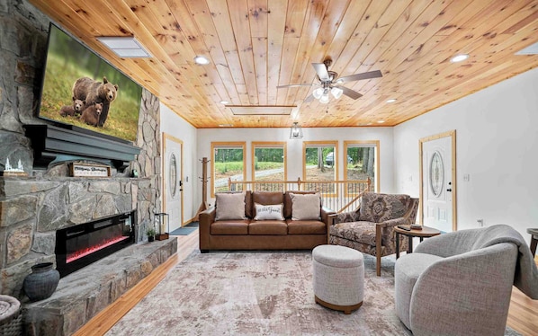 Cabin, Multiple Beds, Patio, Mountain View (Pines and Tines) | Living area | 42-inch flat-screen TV with digital channels, fireplace