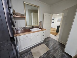 Hair dryer, towels, soap, toilet paper