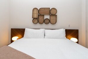 1 bedroom, desk, iron/ironing board, travel crib