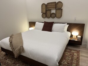 1 bedroom, desk, iron/ironing board, travel crib