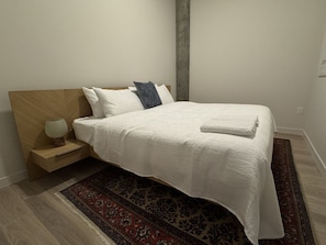 1 bedroom, desk, iron/ironing board, travel crib