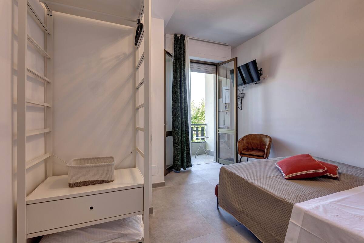 Basic Room | Memory foam beds, blackout drapes, soundproofing, free WiFi