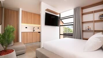 1 bedroom, desk, iron/ironing board, travel crib