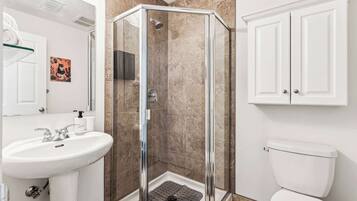 Shower, hair dryer, towels, soap