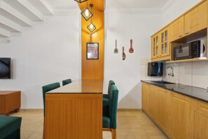 Luxury Condo, 2 Bedrooms, Pool View | Private kitchen - Goan Hideaway - Cuatro (Arpora)