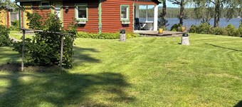 Swedish house directly on the lake with boat ramp & boat