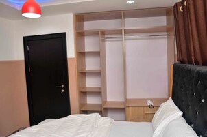 Premium bedding, down comforters, Tempur-Pedic beds, in-room safe