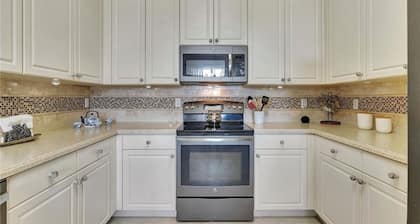 Beautiful first floor Condo in gated community on private Davis Love golf course