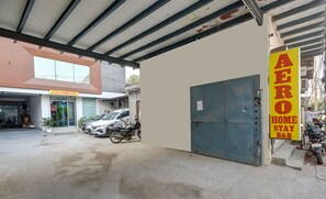 A building with a sign reading "AERO HOME STAY B&B". - HOTEL AERO HOMESTAY (New Delhi)