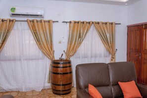 Apartment, 1 Bedroom, Balcony, Garden View | Living room - Charming Apartment in Heart of Douala's Makepe Neighborhood (Douala)
