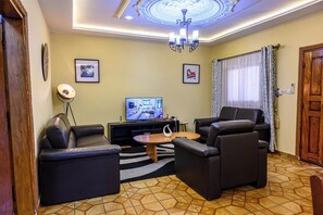 Apartment, 1 Bedroom, Balcony, Garden View | Living room - Berlin Apartment at Residence Baho Douala Makepe BM (Douala)