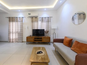 Departamento, 1 habitación, balcón, vista al jardín | Sala de estar