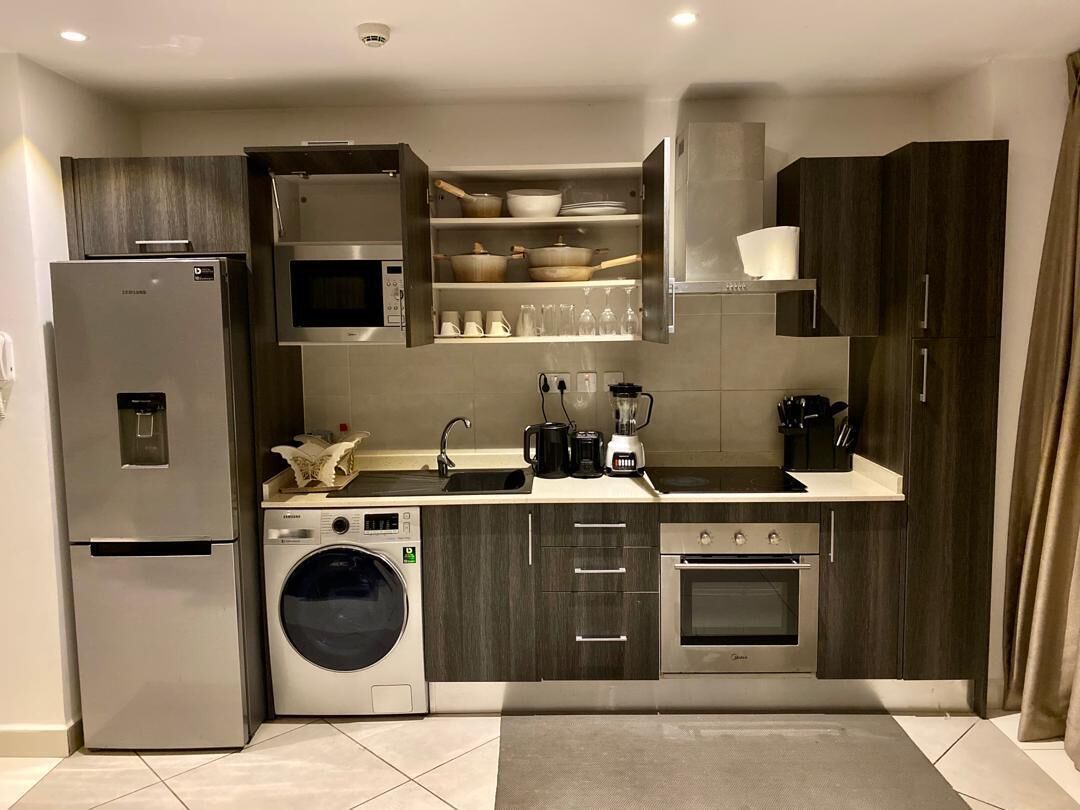 Appartement Duplex | Cuisine privée | Grand réfrigérateur, micro-ondes, four, plaque de cuisson