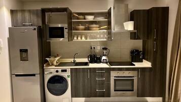 Duplex | Private kitchen | Full-size fridge, microwave, oven, stovetop