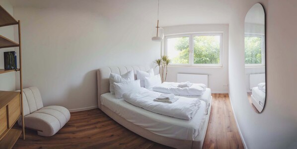 1 bedroom, desk, iron/ironing board, travel crib