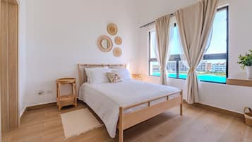 3 habitaciones, tabla de planchar con plancha y cuna de viaje