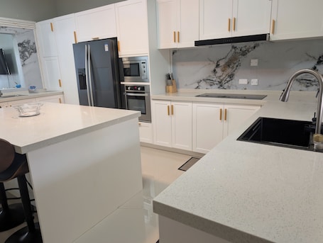 Microwave, oven, stovetop, dishwasher. SunGaze villa with AC in vibrant Orange Hill District Negril