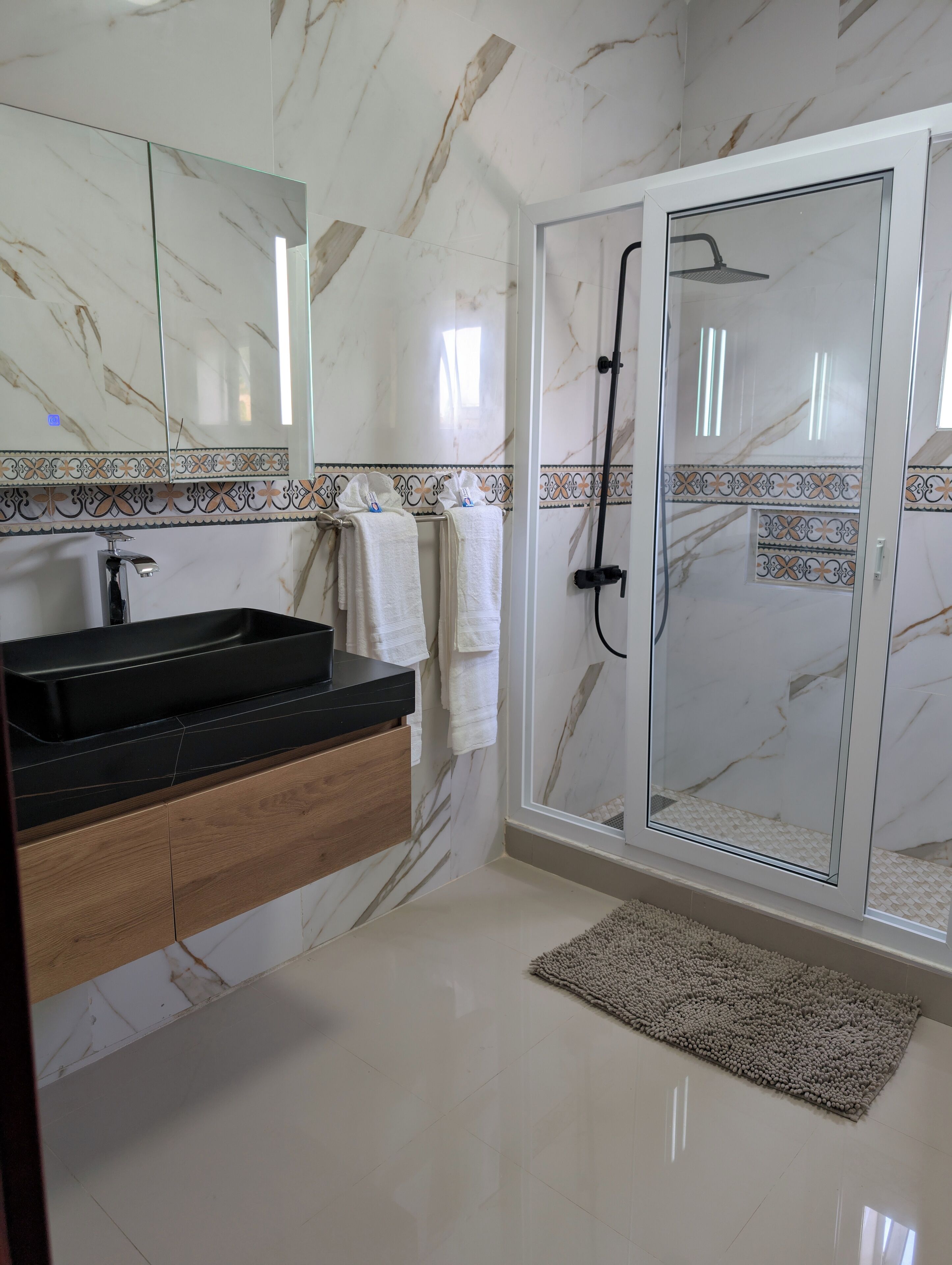 Hair dryer, towels, soap, toilet paper