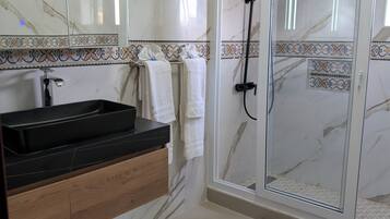 Hair dryer, towels, soap, toilet paper
