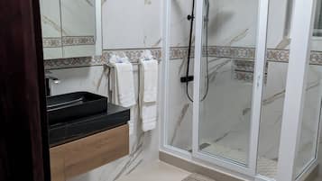 Hair dryer, towels, soap, toilet paper