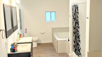 Jetted tub, hair dryer, towels, soap