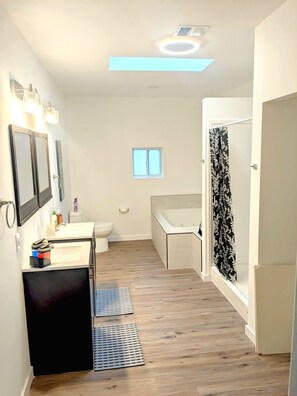 Jetted bath, hair dryer, towels, soap