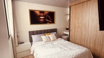 2 habitaciones, tabla de planchar con plancha, wifi y ropa de cama