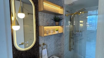 Shower, jetted tub, hair dryer, towels