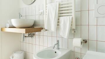 Hair dryer, towels, soap, toilet paper