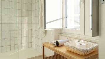 Hair dryer, towels, soap, toilet paper