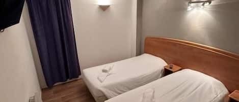 Quadruple Room | Premium bedding, in-room safe, laptop workspace, soundproofing