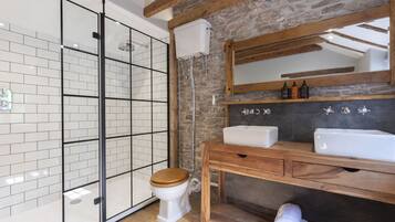 Shower, jetted tub, hair dryer, soap
