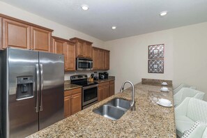 Townhome, Multiple Beds, Pool Access, Pool View (Enchanted Clock Tower) | Private kitchen | Fridge, microwave, oven, stovetop