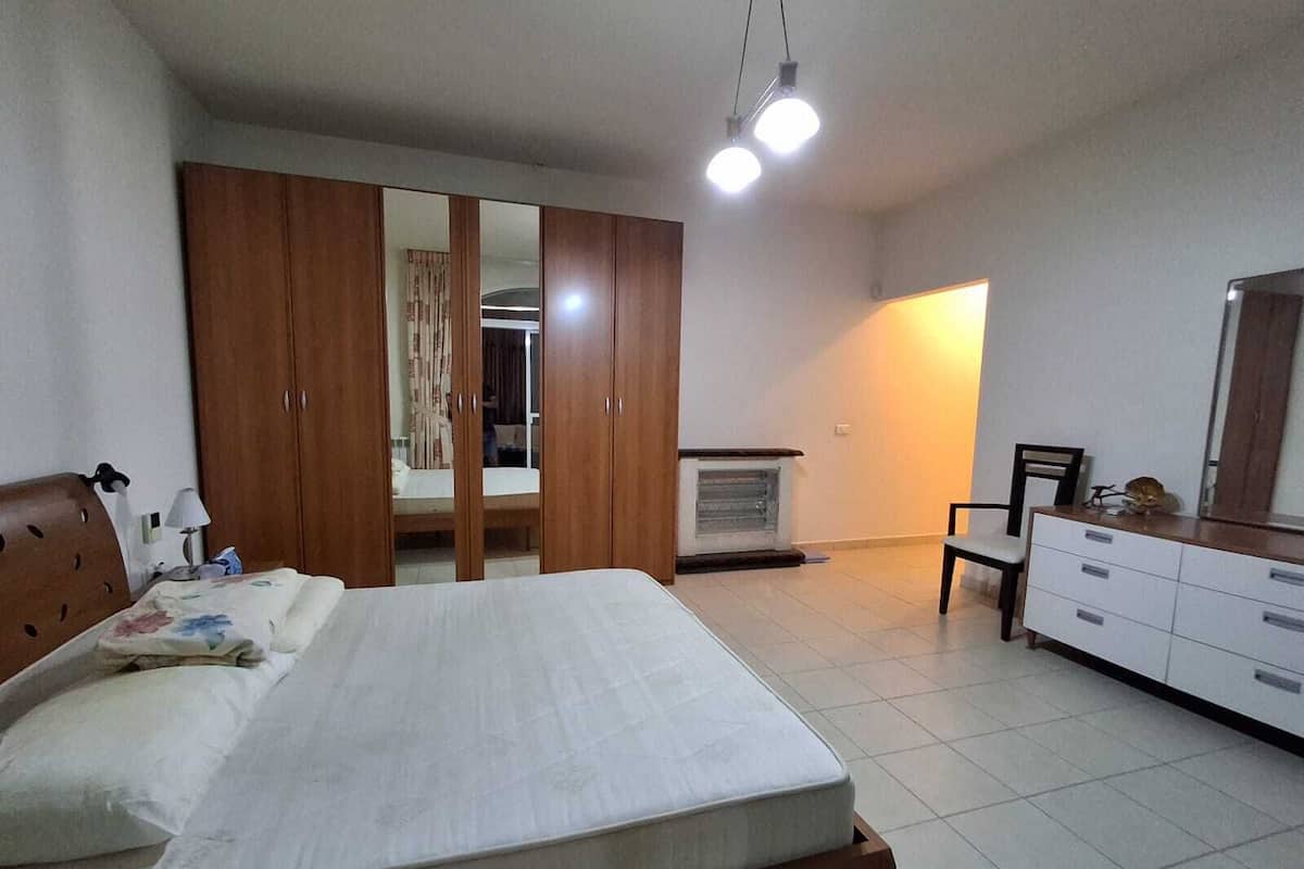 Family Apartment, Sea View | Desk, laptop workspace, blackout drapes, soundproofing