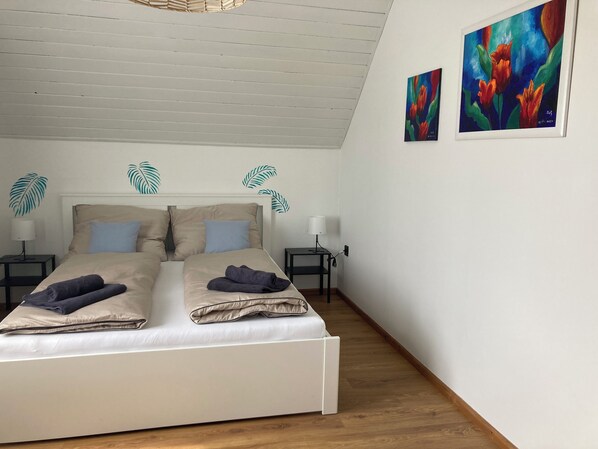 4 bedrooms, iron/ironing board, travel cot, WiFi
