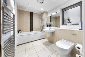 Hair dryer, towels, soap, toilet paper