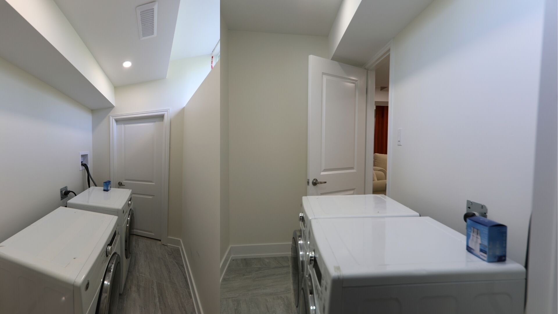 Un pasillo estrecho con dos lavadoras blancas, una puerta que da a otra habitación y un enchufe a la vista.