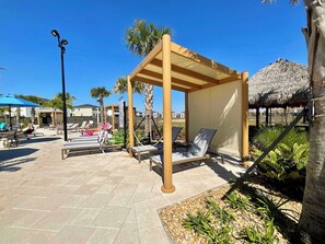 Hus - flere senge - adgang til pool - udsigt til pool (Jungle House At Championsgate) | Overnatningsstedets område