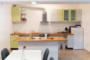 Oven, dishwasher, dining tables, kitchen islands