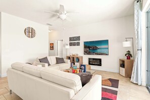 House, Multiple Beds, Pool Access, Pool View (Solterra Bliss) | Living area | 42-inch flat-screen TV with digital channels