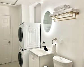 Hair dryer, towels, soap, shampoo