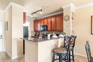 Condo, Multiple Beds, Pool Access, Garden View (Tuscan Paradise At Bella Piazza) | Private kitchen | Fridge, microwave, oven, stovetop