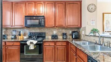 Condo, Multiple Beds, Pool Access, Garden View (Tuscan Paradise At Bella Piazza) | Private kitchen | Fridge, microwave, oven, stovetop