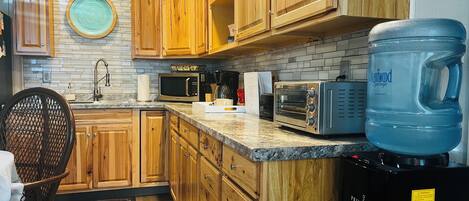 Fridge, microwave, coffee/tea maker, toaster