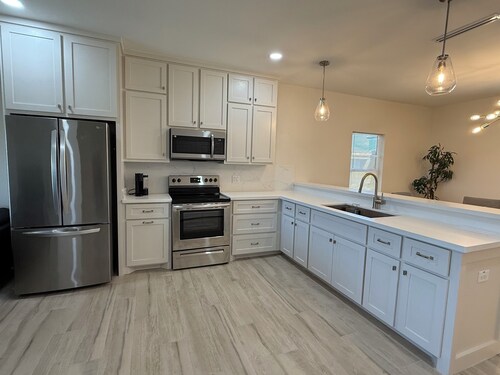 Perfect location 3-bedroom house with AC in charming Mission. Gated Community.