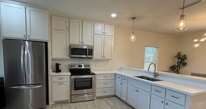 Perfect location 3-bedroom house with AC in charming Mission. Gated Community.